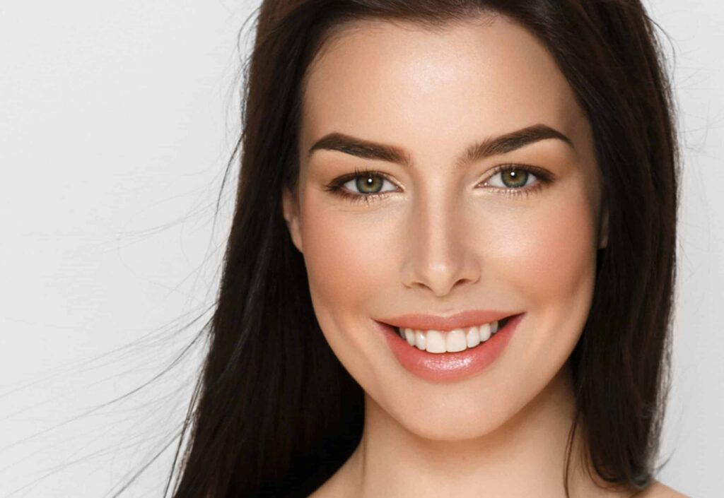 Close-up of thick prominent eyelashes on woman, which have grown thanks to daily use of Latisse.